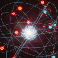 What are the properties of nuclear particles such as protons, neutrons, and electrons?